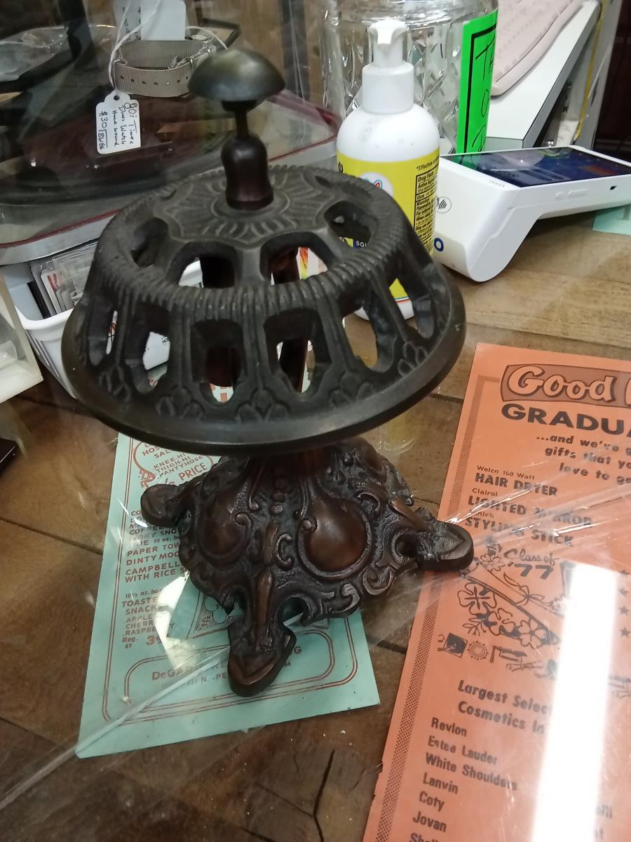 Antique Cast Iron String Holder